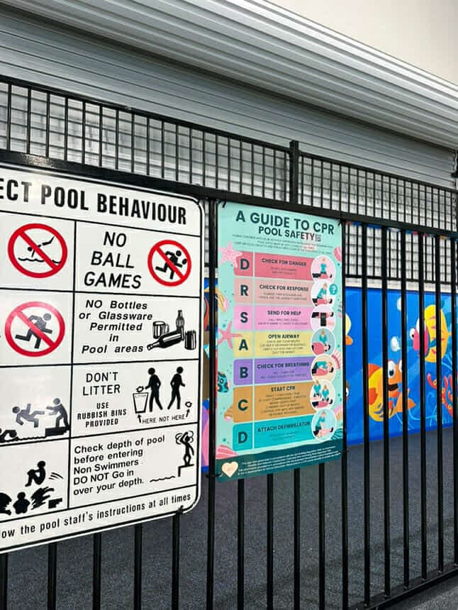 Pool signs at commercial swim school